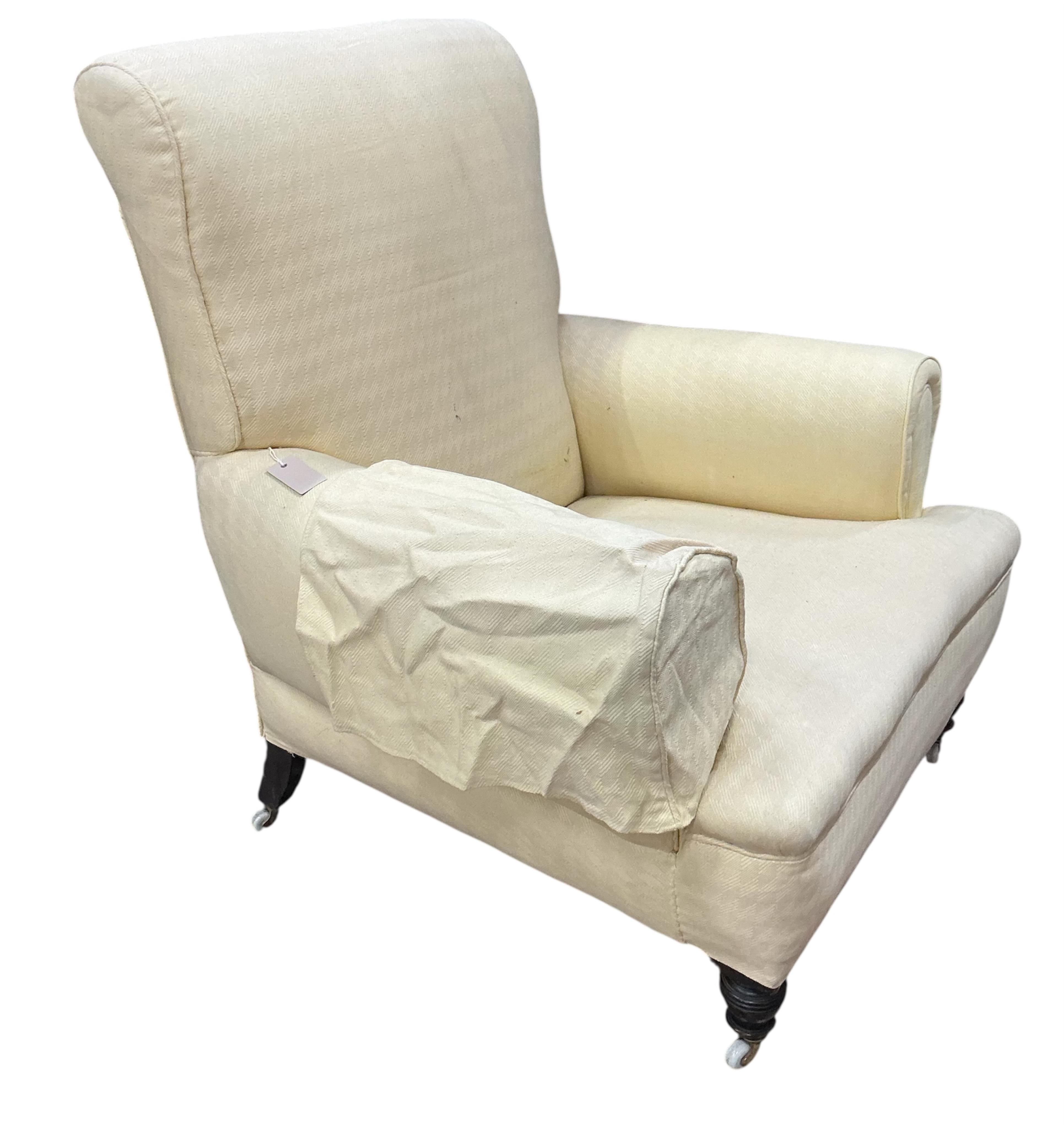 A late Victorian upholstered armchair, width 88cm, depth 80cm, height 100cm